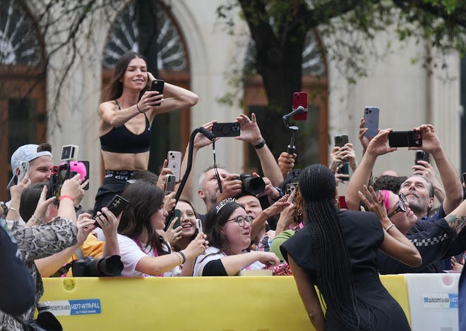 Actress Gabrielle Union says hello to fans during the premiere of "The Idea of You" at Paramount Theatre in downtown Austin during SXSW Saturday, March 16, 2024. Union produced the film.