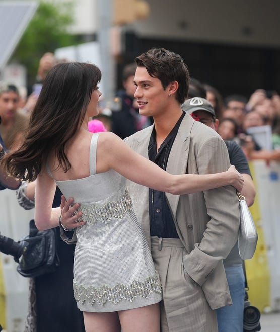 Actor Nicholas Galitzine greets actress Anne Hathaway during the premiere of "The Idea of You" at Paramount Theatre in downtown Austin during SXSW Saturday, March 16, 2024.
